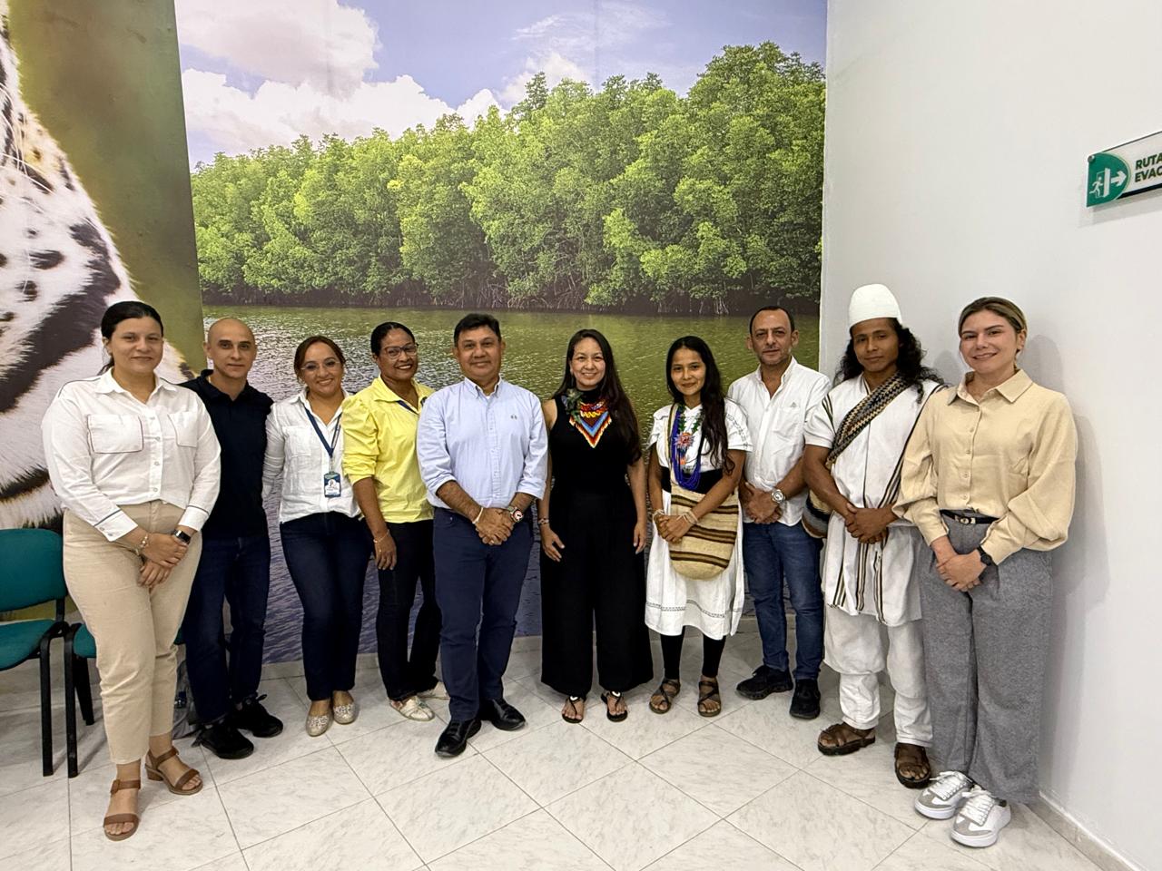 Foto de grupo con la ministra y el director